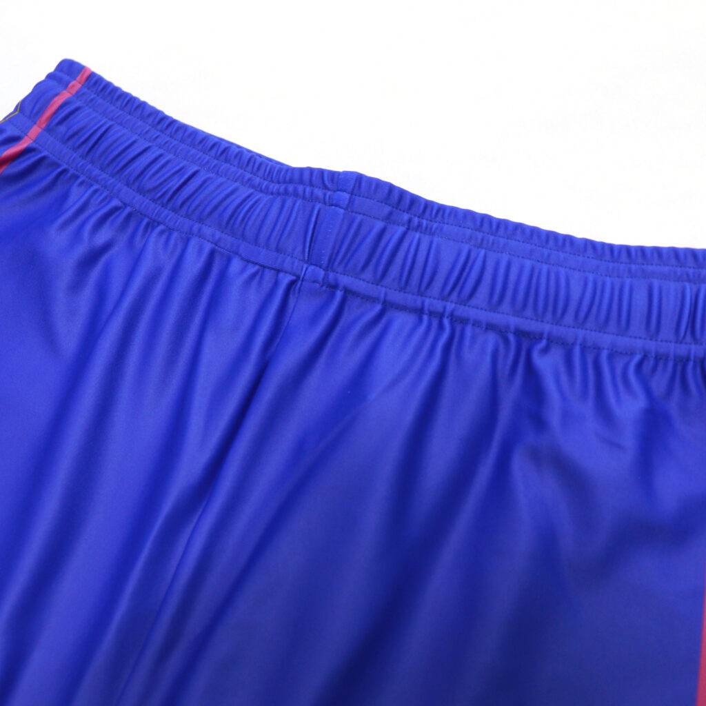 Elastic waistband detail on blue volleyball shorts