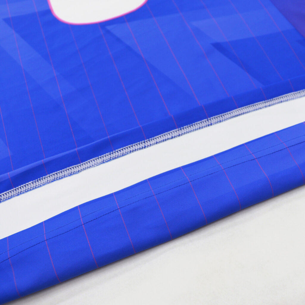 Flatlock hem stitching detail on sublimated volleyball jersey