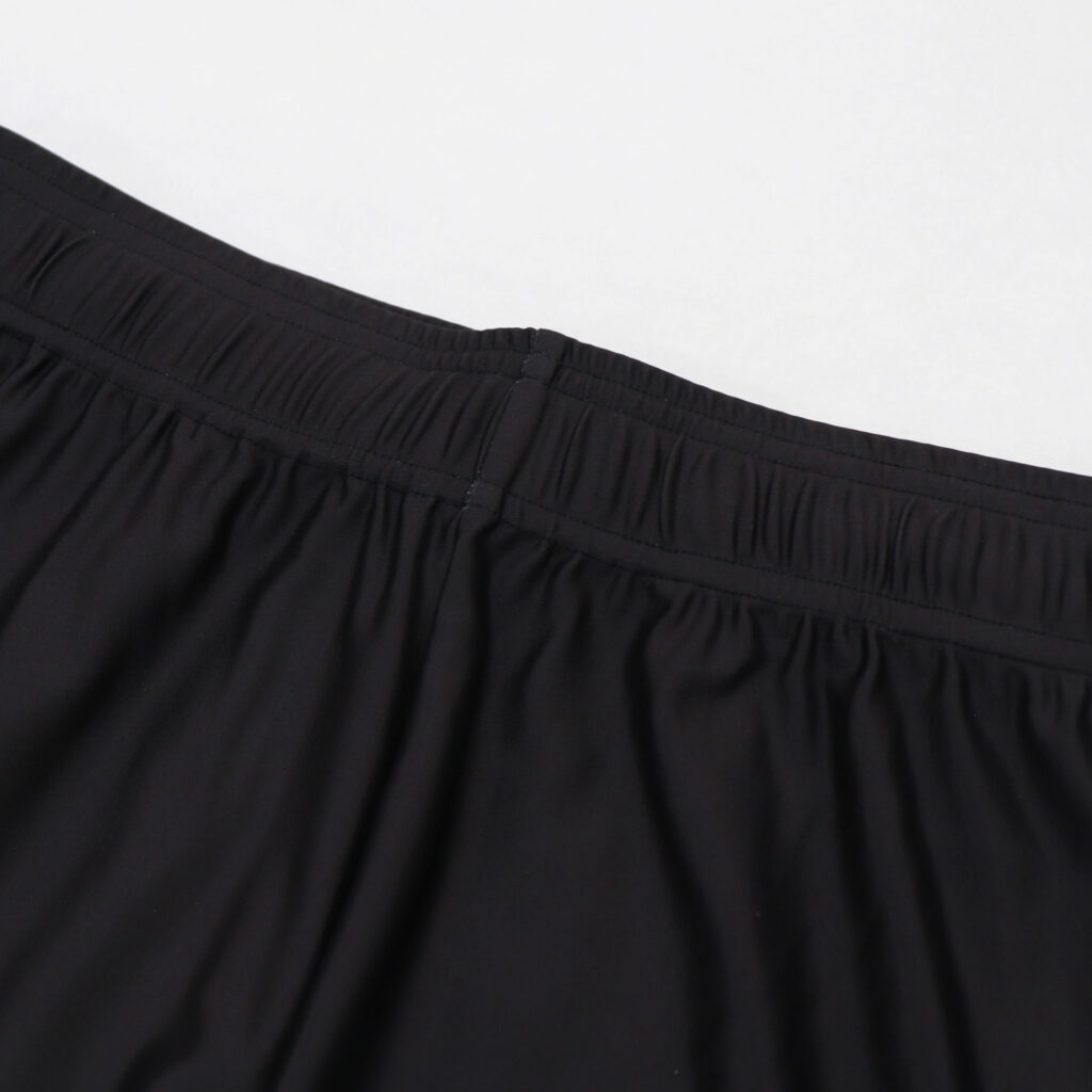 Elastic waistband detail on black volleyball shorts