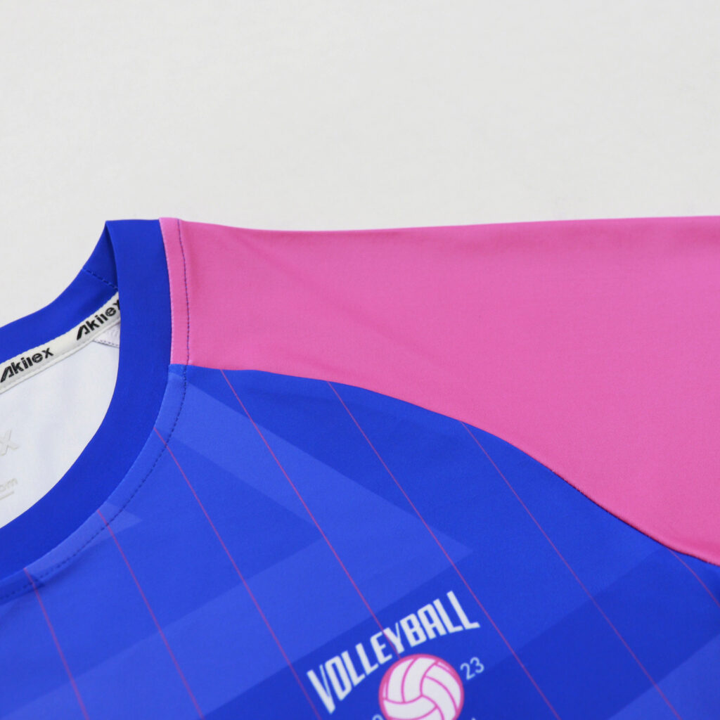 Pink shoulder panel and volleyball chest logo detail