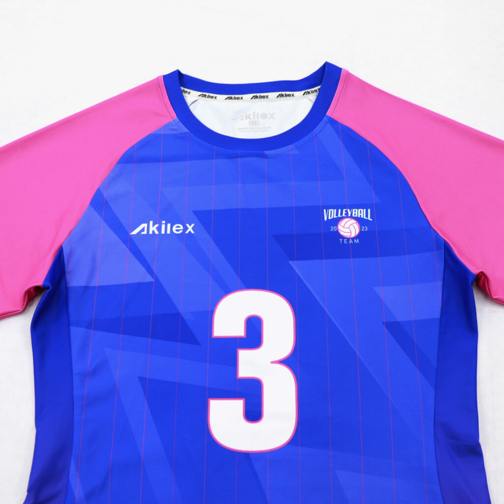 Front view of blue and pink long sleeve sublimated volleyball jersey