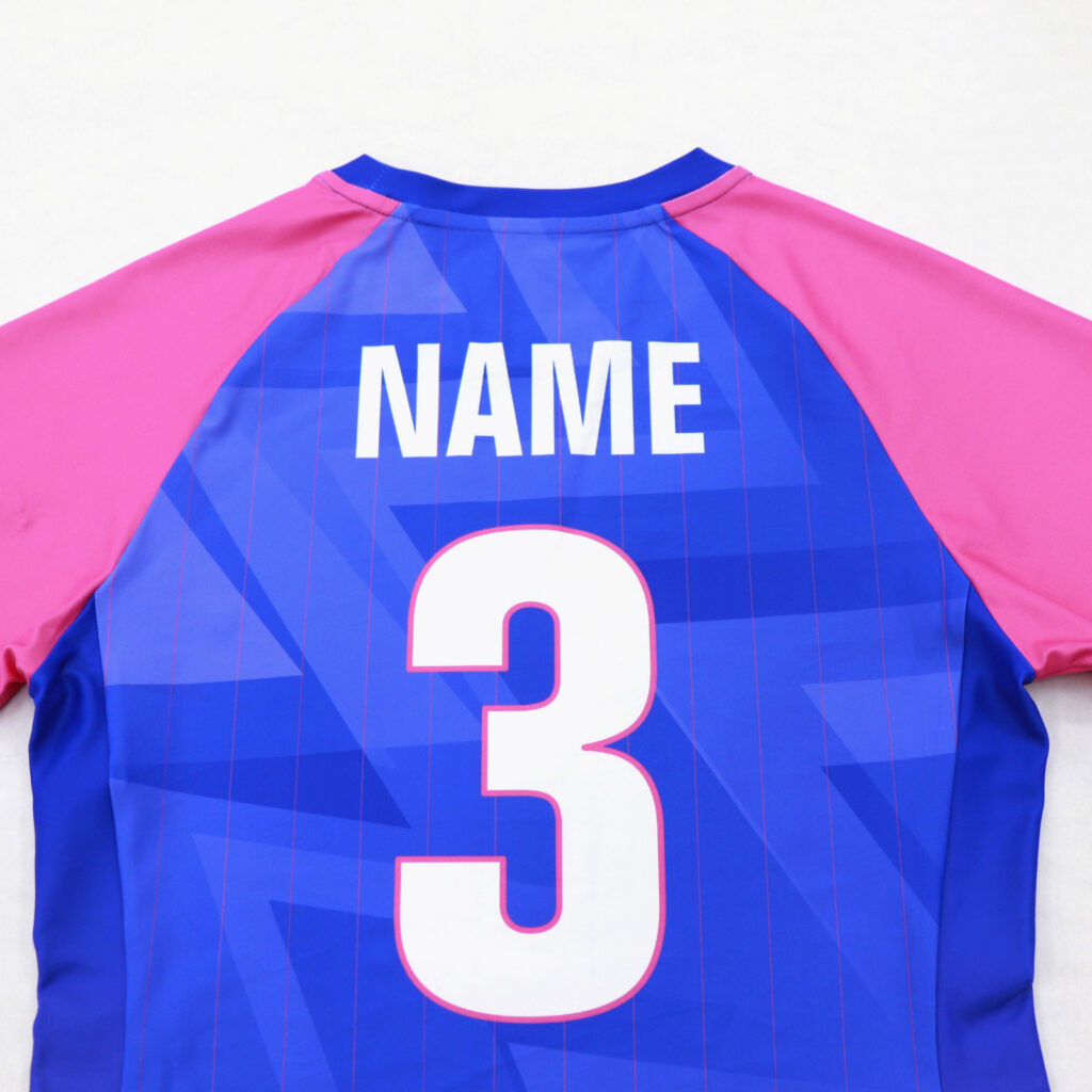 Back view with custom player name and number on volleyball jersey