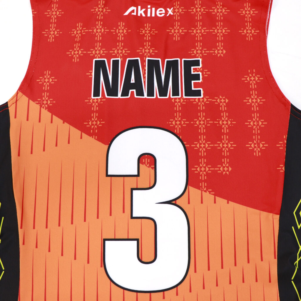 Back view with custom name and number on orange volleyball jersey