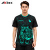 Model facing forward in a black shirt with a turquoise tiger graphic, cracked lines and chest markings.